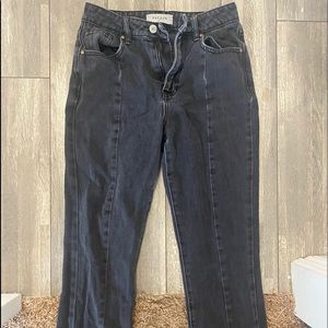 Pace in black jeans with detailing